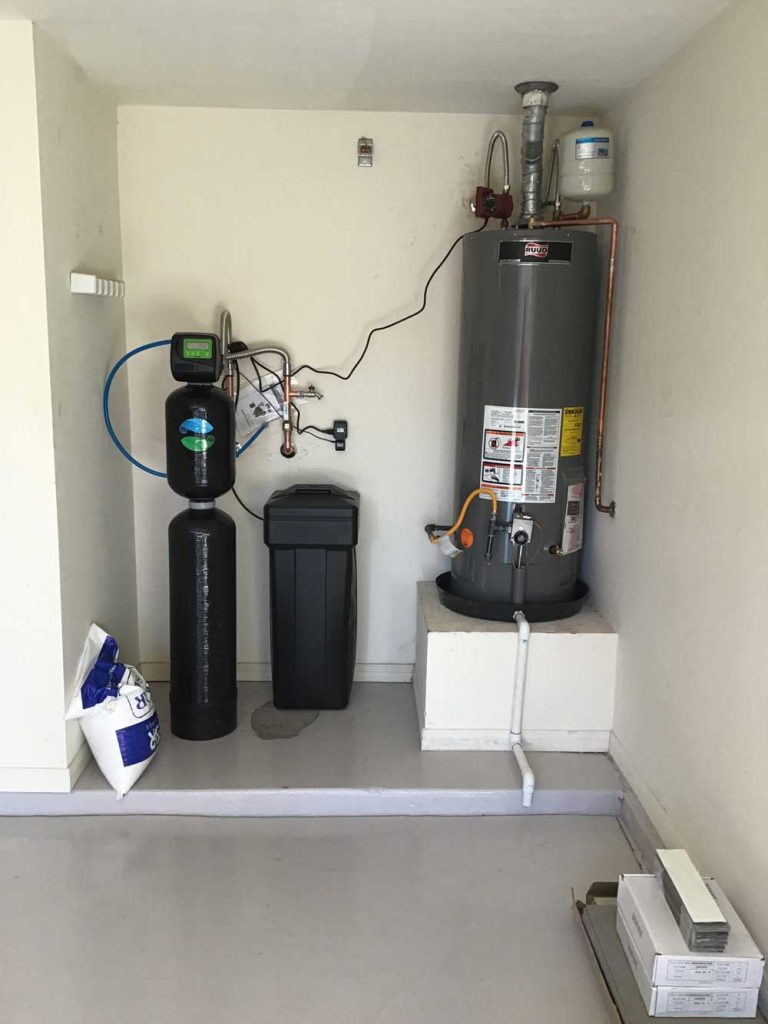 Installed tank water heater by affordable plumbing, rooter & water heaters