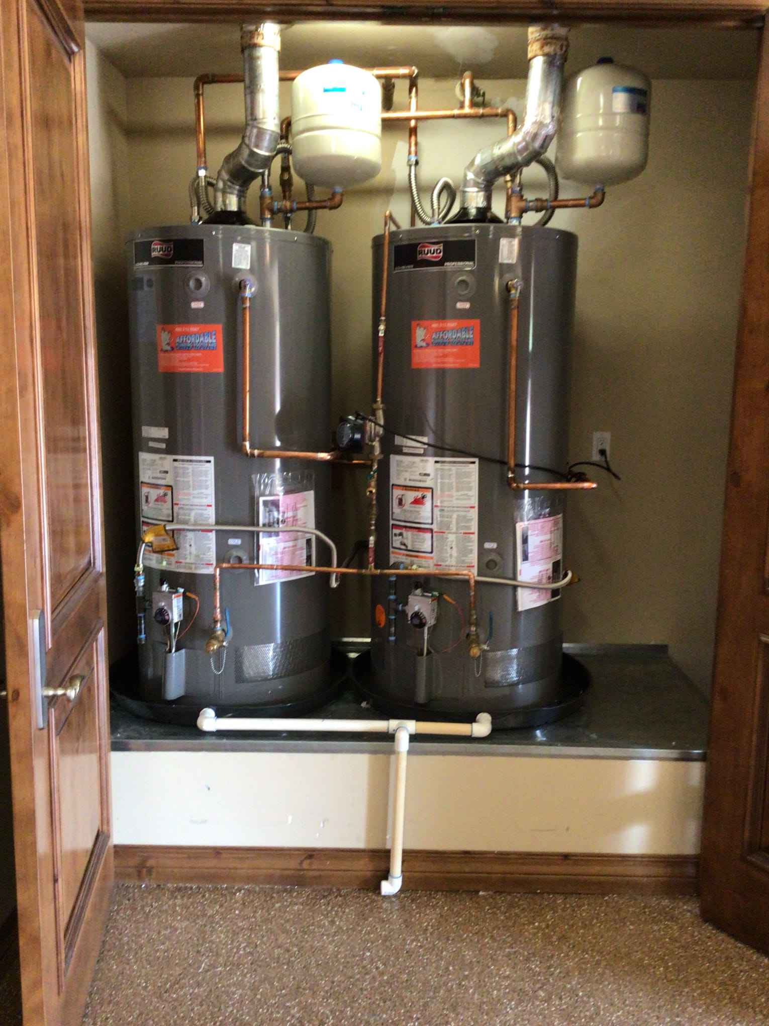 twin water heaters in a residential home